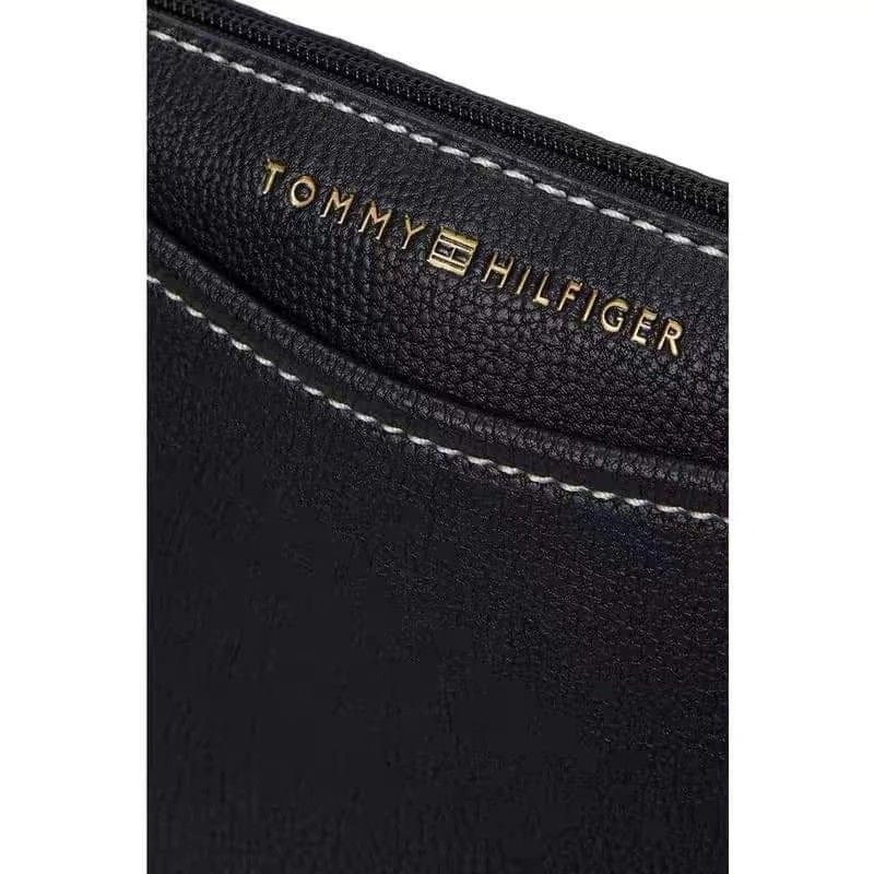 TOMMY H. SLING & CROSSBODY BAG (Category: Sling Bags) located in Makati City. Submitted by mcuachon (Listing ID 1278778927, Image 2). Description: Tommy H. Sling & Crossbody Bag UNISEX Leather Available Colors: Black & Navy Blue.