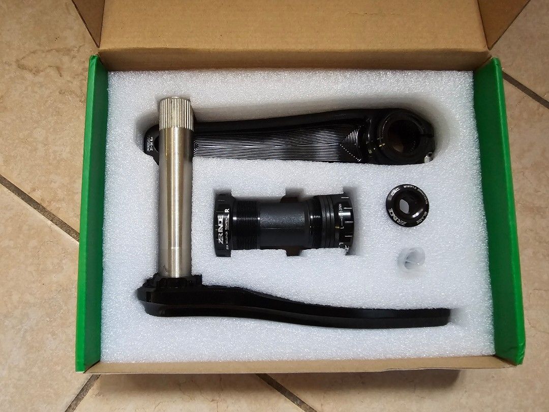 Zrace blade crankset outlet