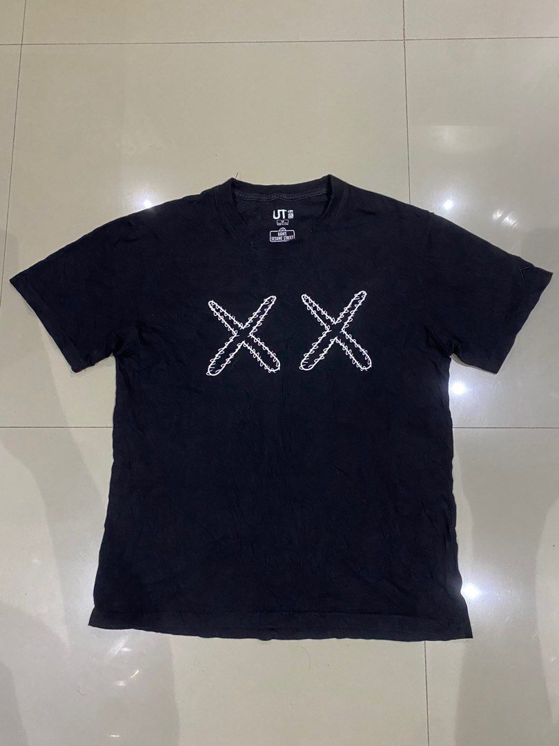 KAWS UNIQLO SHIRT (Category: Tshirts & Polo Shirts ) located in Polangui. Submitted by judeeey (Listing ID 1278962699, Image 1). Description: Kaws x Sesame Street x Uniqlo 19x25 issue: need wash Item is thrifted, manage your expectations Payment via gcash, shipping thru JNT EXPRESS location Polangui Albay.
