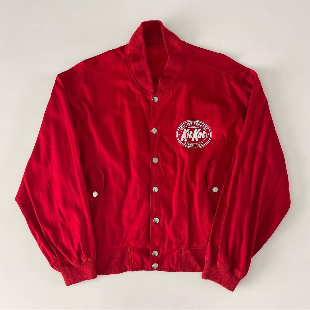 KitKat 50th Anniversary Bomber Jacket (M-L) (Category: Coats, Jackets and Outerwear) located in Paranaque City. Submitted by tochbarreiro (Listing ID 1278996296, Image 2). Description: KitKat 50th Anniversary Bomber Jacket PHP 3,490 + shipping fee Fits up to a slim Size L Width: 25 in Length: 24 in *Person Sport designed the jacket. Selling price on Grailed is USD 278. Small hole by pocket area Disclaimer: This is a secondhand item. Some flaws ma
