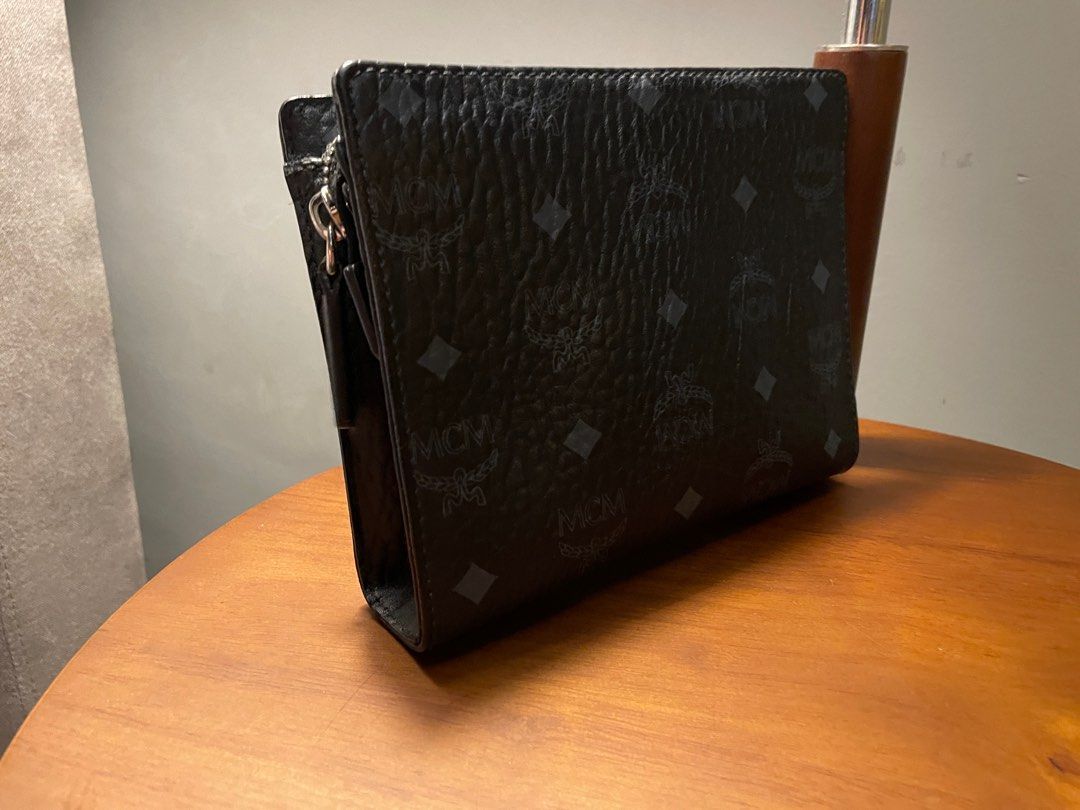 Mcm black hot sale clutch bag
