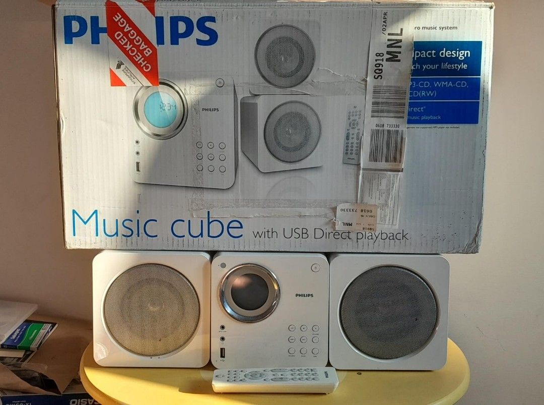 RUSH SALE! Philips Music Cube complete set (Category: Portable Music Players) located in Manila. Submitted by mr.teatarik (Listing ID 1279026682, Image 3). Description: I'm selling my Philips Music Cube compo set complete with box, remote control & set of CDs for u to play songs. Tip top condition 9/10, have great surround sound perfect for your home theater. More details at : https://www.philips.com.sg/c-p/MCM103_98/- Shipping not included accep