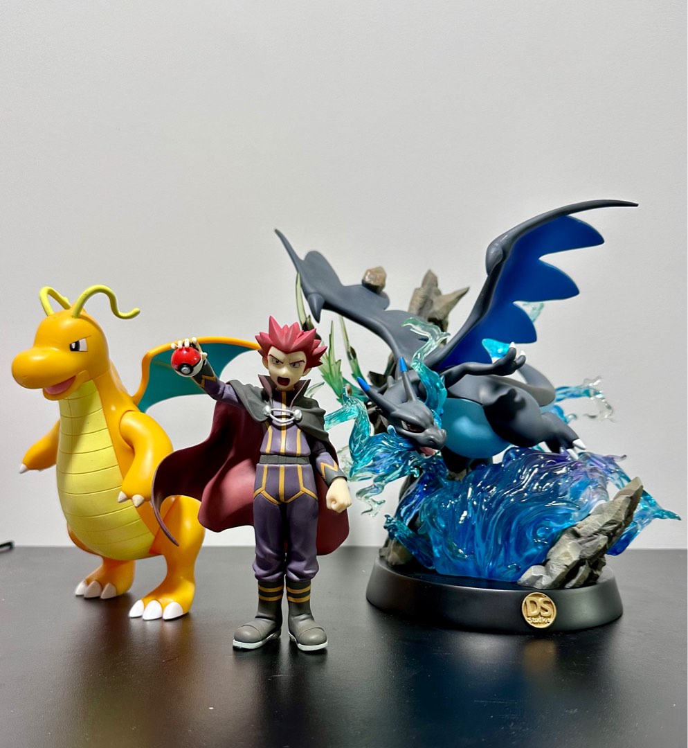 Pokemon Lance with Dragonite and Mega Charizard figure