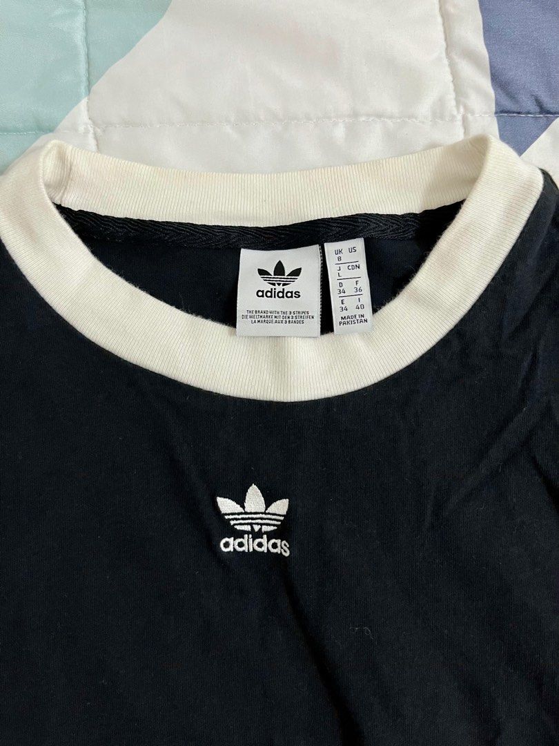 ADIDAS Cropped Shirt Top (Category: Shirts) located in San Luis. Submitted by chengdecluttering (Listing ID 1279312494, Image 2). Description: ADIDAS Cropped Shirt Top •condition: 10/10 •worn twice •mop: gcash •mod: j&t •comes with a freebie 🤍.