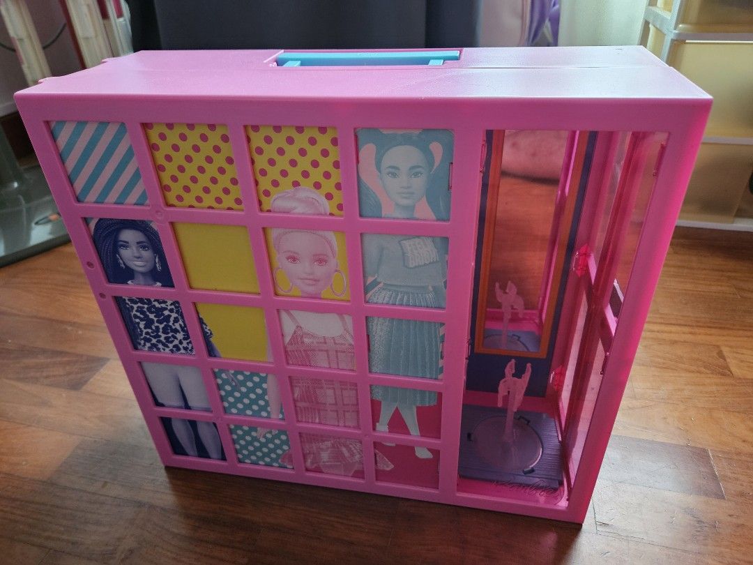 Barbie 3 storey townhouse and wardrobe comes with alot of