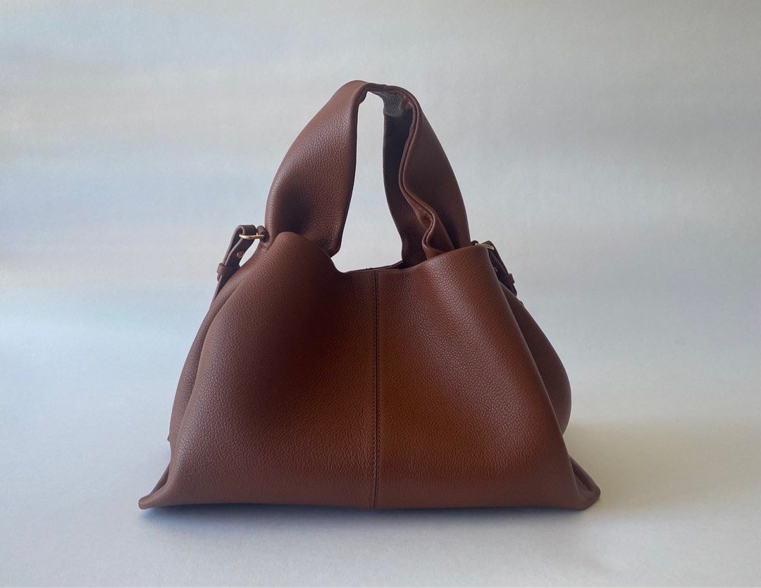 BRANDNEW POLENE NUMERO NEUF COGNAC (Category: Luxury Bags & Wallets) located in Taguig. Submitted by sweetluxuryph (Listing ID 1279481952, Image 3). Description: 💯 GUARANTEED AUTHENTIC ✨38,000✨ Organic Design Strikes Right Balance Between Elegant, Flexibility and Hold Cognac- Designer Colour Soft Textured Calfskin Leather Hand-made, Hand-stitching Dimensions-12.5”x8”x” Top Handle Drop-5” Adjustable & Detachable Strap Comes with Receipt, Tag, Dus