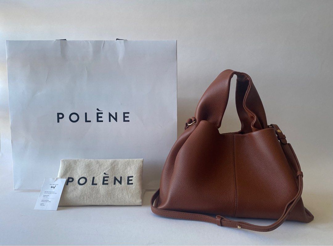 BRANDNEW POLENE NUMERO NEUF COGNAC (Category: Luxury Bags & Wallets) located in Taguig. Submitted by sweetluxuryph (Listing ID 1279481952, Image 1). Description: 💯 GUARANTEED AUTHENTIC ✨38,000✨ Organic Design Strikes Right Balance Between Elegant, Flexibility and Hold Cognac- Designer Colour Soft Textured Calfskin Leather Hand-made, Hand-stitching Dimensions-12.5”x8”x” Top Handle Drop-5” Adjustable & Detachable Strap Comes with Receipt, Tag, Dus