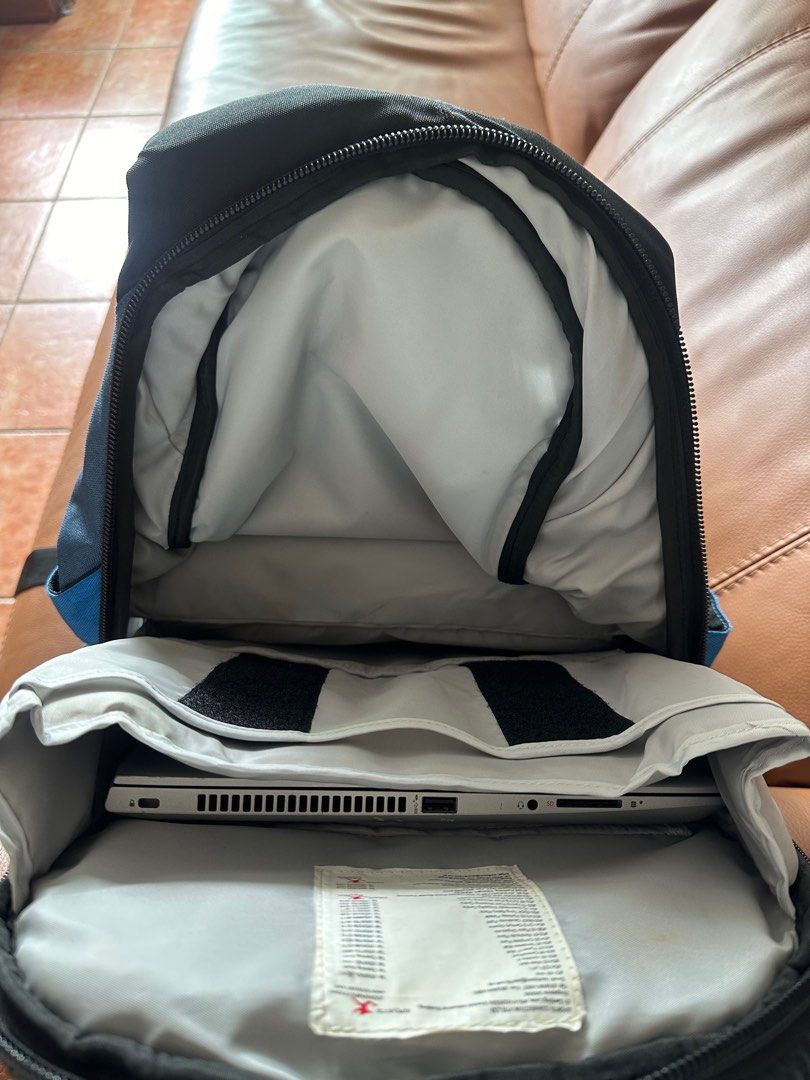Camera backpack (Category: Backpacks) located in Singapore. Submitted by mavericke (Listing ID 1279301439, Image 4). Description: Barely used camera backpack for sale. Used 2-3 times only. Includes: - A zippered compartment to fit one DSLR and 2 lenses - A padded compartment to fit one 14” laptop and tablet - another few compartments for other miscellaneous items Laptop in picture tor illustration only. Does not include laptop, DSLR, lenses or ot