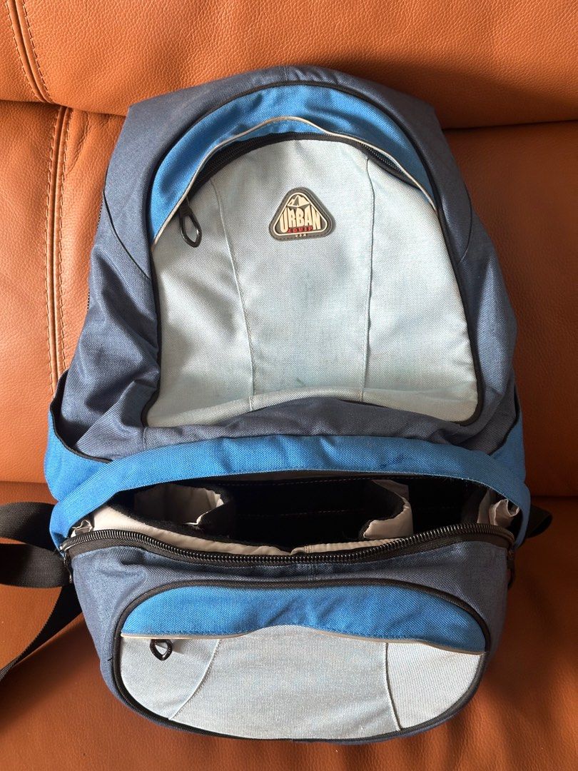 Camera backpack (Category: Backpacks) located in Singapore. Submitted by mavericke (Listing ID 1279301439, Image 2). Description: Barely used camera backpack for sale. Used 2-3 times only. Includes: - A zippered compartment to fit one DSLR and 2 lenses - A padded compartment to fit one 14” laptop and tablet - another few compartments for other miscellaneous items Laptop in picture tor illustration only. Does not include laptop, DSLR, lenses or ot