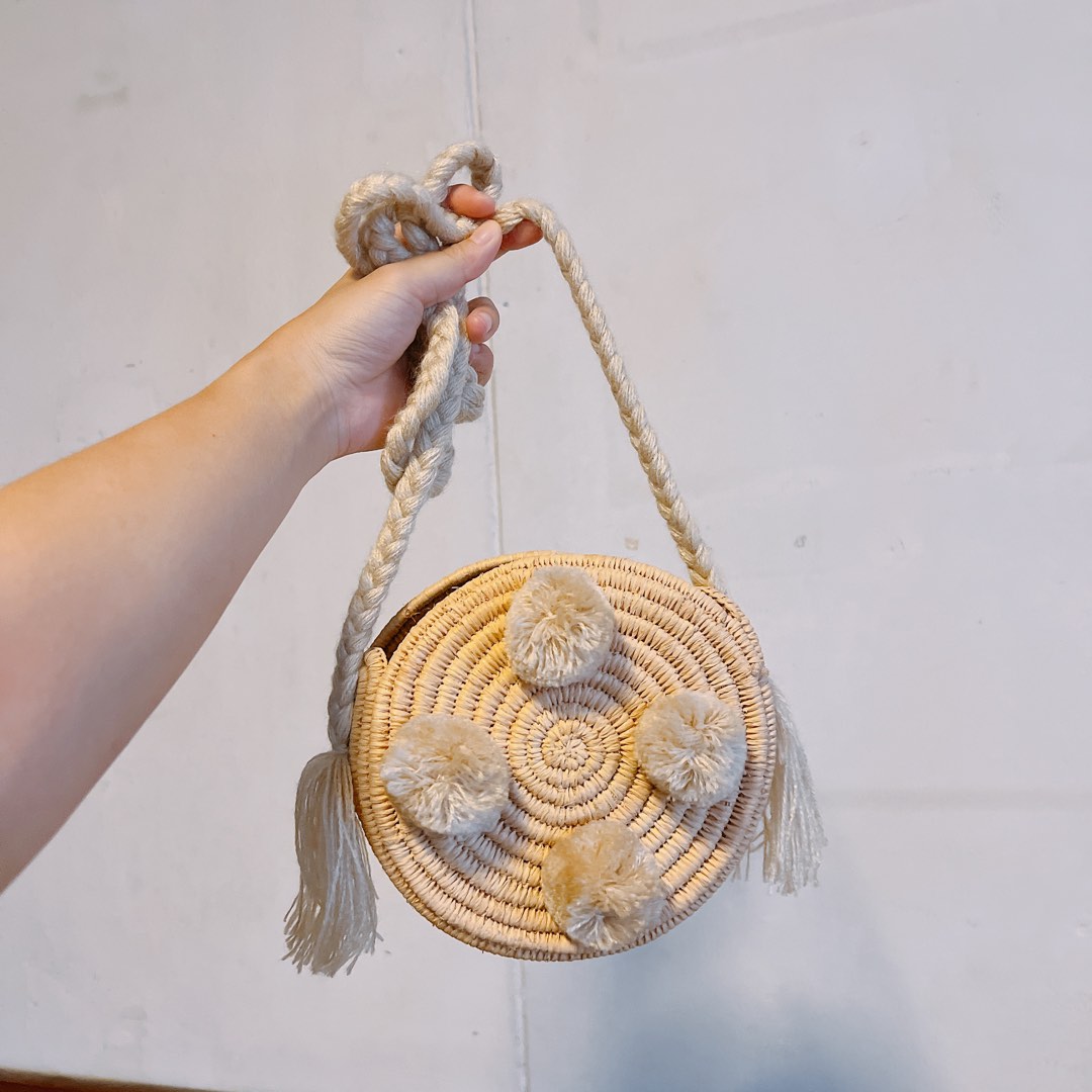 Woven pom pom bag hot sale