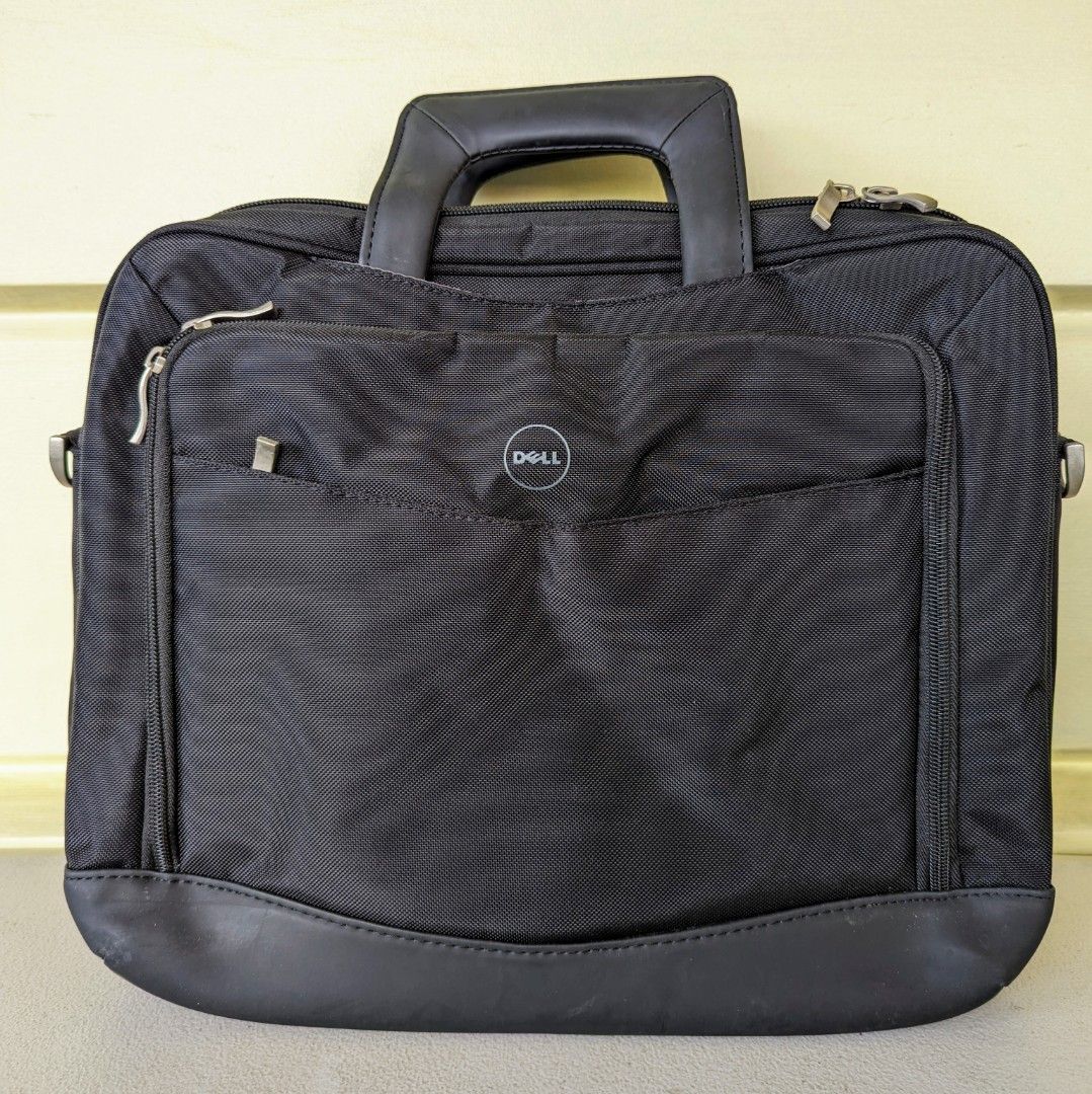 Dell Laptop Bag ( 4 zippered pockets) (Category: Laptop Bags & Sleeves) located in Cainta. Submitted by almurk (Listing ID 1279272481, Image 1). Description: Selling slightly used Dell Laptop Bag / Briefcase Excellent organizing features with 4 zippered pockets plus extra pockets and luggage pass through. RFS: Decluttering.