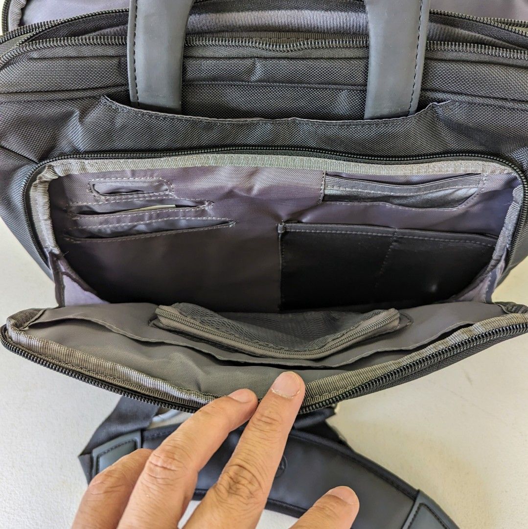 Dell Laptop Bag ( 4 zippered pockets) (Category: Laptop Bags & Sleeves) located in Cainta. Submitted by almurk (Listing ID 1279272481, Image 3). Description: Selling slightly used Dell Laptop Bag / Briefcase Excellent organizing features with 4 zippered pockets plus extra pockets and luggage pass through. RFS: Decluttering.