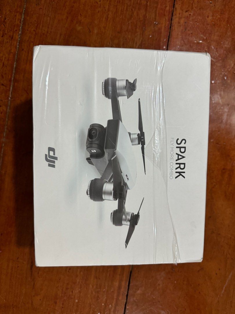 DJI Spark FLYMORE Combo (Category: Drones) located in Manila. Submitted by kc.kc5 (Listing ID 1279364741, Image 2). Description: 2 Batteries 4 propeller guards 3 extra propellers 1 protective case 1 power adapter 1 charging bay 1 bag 1 connectable remote.