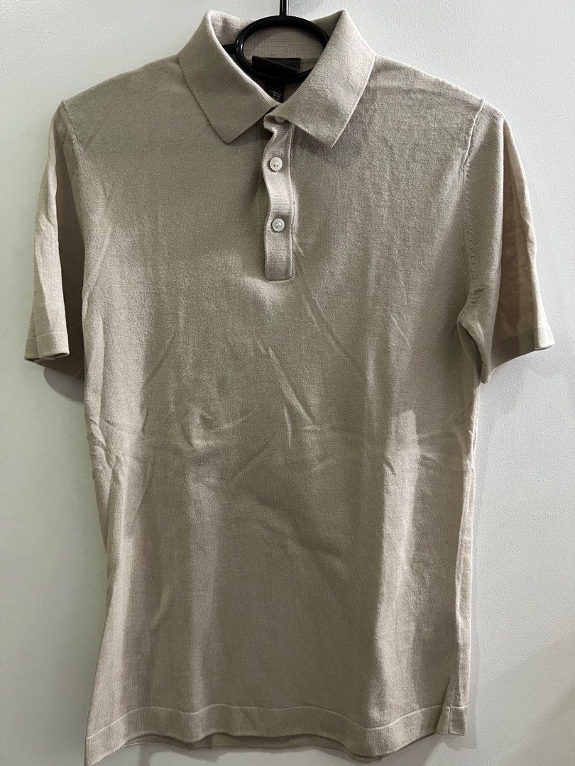 H&M Knit Polo Shirt (Category: Tshirts & Polo Shirts ) located in Quezon City. Submitted by karmv (Listing ID 1279477195, Image 1). Description: Brand: H&M Color: Light Beige Sizing: Slim fit, XS Condition: Used once, no issues, no damage/discoloration, still in good condition RFS: Tried but does not look good on me.