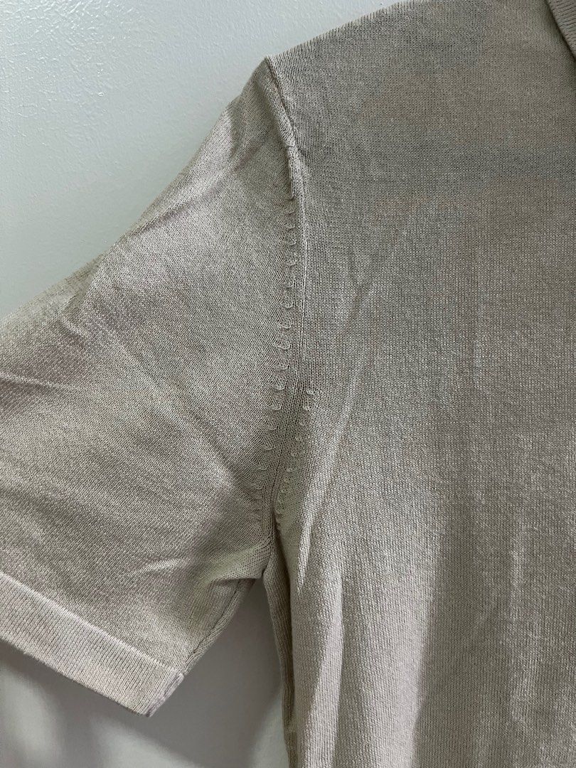 H&M Knit Polo Shirt (Category: Tshirts & Polo Shirts ) located in Quezon City. Submitted by karmv (Listing ID 1279477195, Image 3). Description: Brand: H&M Color: Light Beige Sizing: Slim fit, XS Condition: Used once, no issues, no damage/discoloration, still in good condition RFS: Tried but does not look good on me.