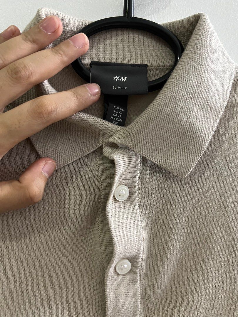 H&M Knit Polo Shirt (Category: Tshirts & Polo Shirts ) located in Quezon City. Submitted by karmv (Listing ID 1279477195, Image 2). Description: Brand: H&M Color: Light Beige Sizing: Slim fit, XS Condition: Used once, no issues, no damage/discoloration, still in good condition RFS: Tried but does not look good on me.