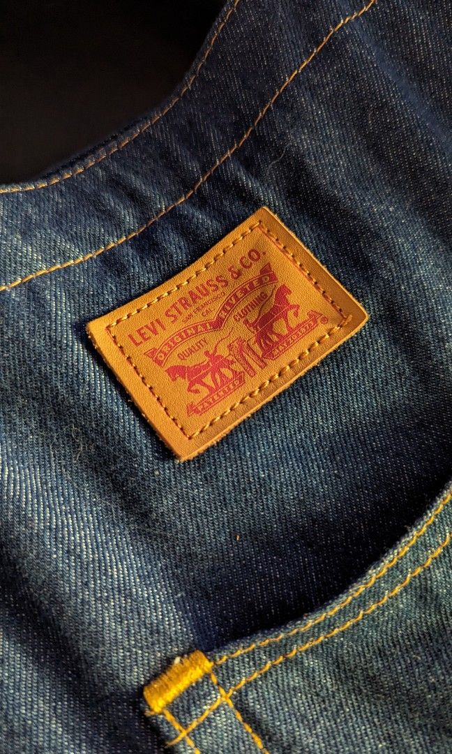LEVI'S DENIM TOTE BAG Front Pocket Leather Patch (Category: Tote Bags) located in Pasay City. Submitted by bottomdrawermnl (Listing ID 1279350906, Image 1). Description: LEVI'S DENIM TOTE BAG - 17.5" x 18" - small interior pocket in white cloth - Leather Patch and back pocket detail - used four times mostly carrying an ipad and clothes - never been washed - Color: 10/10 like new - no issues with stitching/fraying DM is 🔑.