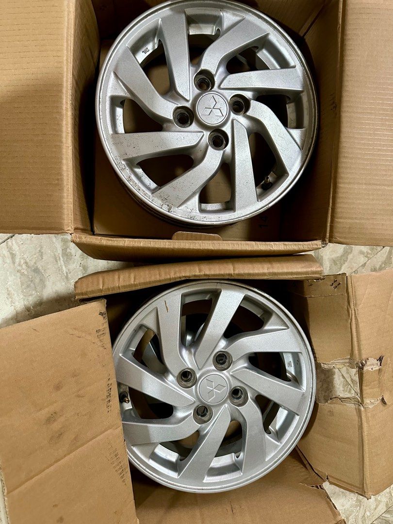 Mitsubishi Mirage Hatchback 2016 Original mags (Category: Other Automotive Parts and Accessories) located in Valenzuela. Submitted by halohaloatbp (Listing ID 1279284589, Image 2). Description: Mitsubishi Mirage Hatchback 2016 Original mags ▪️4 pcs / 4 holes ▪️Size 165/65R14 ▪️Used w/minimal scratches RFS: Upgraded P10,000 w/free seat cover color gray never used stocked only Feel free to msg me. Pickup/Meetup: Valenzuela or Quezon city area.