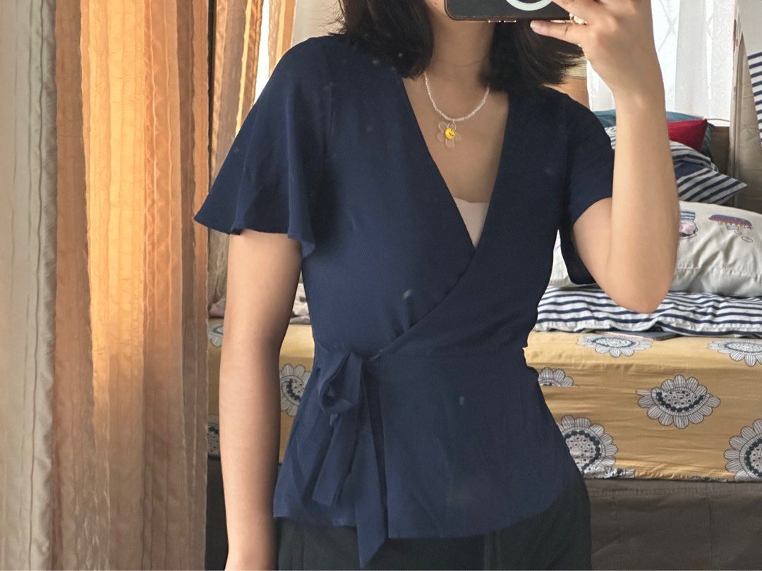 Navy blue robe top (Category: Blouses) located in Mandaluyong City. Submitted by tenohthree (Listing ID 1279265297, Image 2). Description: Super classy top. Neckline is low V in case you have the chest to show off. .