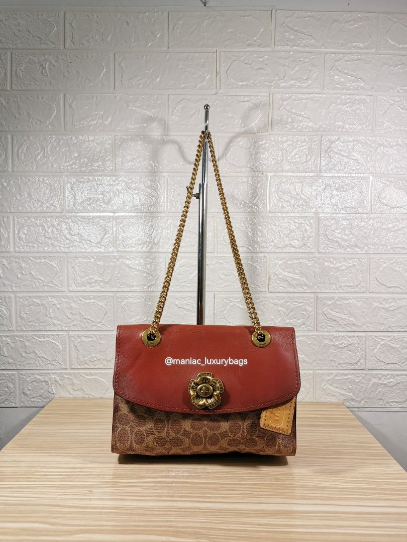 Coach parker in signature canvas with tea rose turnlock top