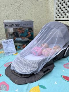 Snuggle nest Co-sleeper travel bed for babies
