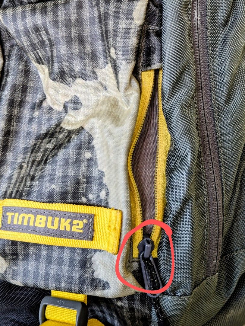 Timbuk2 Showdown Laptop Backpack (Category: Backpacks) located in Cainta. Submitted by almurk (Listing ID 1279277848, Image 3). Description: Timbuk2 Showdown Laptop Backpack well used with wear and tear. see photos. Unable to close the front lower right zipper. (Stuck) RFS: Decluttering.