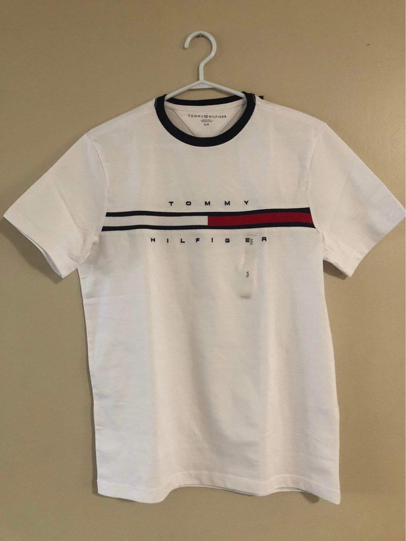 Tommy Hilfiger (Category: Tshirts & Polo Shirts ) located in Quezon City. Submitted by andreijames (Listing ID 1279430452, Image 1). Description: Tommy Hilfiger Tshirt Brandnew and Original with paperbag Size: M only.