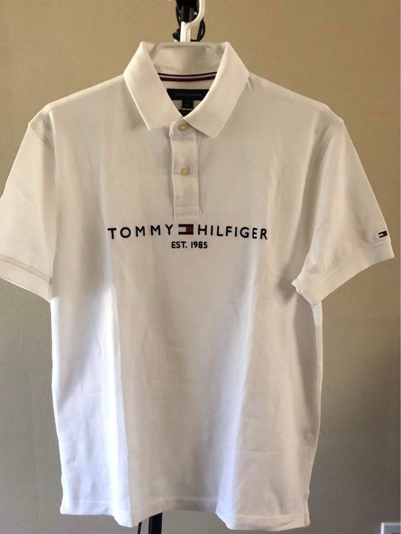 Tommy Hilfiger Polo Shirt (Category: Tshirts & Polo Shirts ) located in Quezon City. Submitted by andreijames (Listing ID 1279422303, Image 2). Description: Tommy Hilfiger Polo Shirt Brandnew and Original with paperbag Sizes Navy Blue: M Black: M White: M.