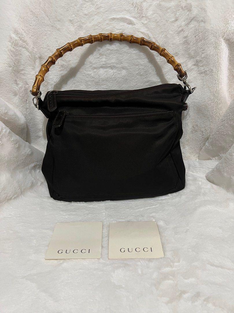 💯 Authentic Gucci Bamboo Nylon Shoulder Bag Small to Medium (Category: Luxury Bags & Wallets) located in Paranaque City. Submitted by authentic_mj (Listing ID 1279601706, Image 1). Description: 💯 Authentic Gucci Bamboo Nylon Shoulder Bag Small to Medium Preloved Authentic from Japan with original card Issue: holes near handle joints.