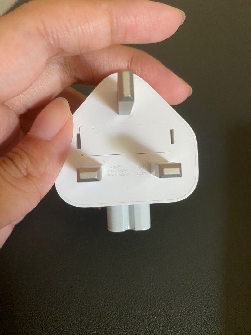 Apple International charger Type G plug Adaptor (Category: Cables & Adaptors) located in Marikina City. Submitted by janellyma (Listing ID 1279513053, Image 3). Description: - Never used Apple type G plug adaptor - can be used with apple macbooks - type G plug is common in these countries: Bahrain, Ireland, Malaysia, Malta, Saudi Arabia, Singapore, Sri Lanka, and UAE Also available: type G plug with extension cord. Brand new. See last pic. Separa
