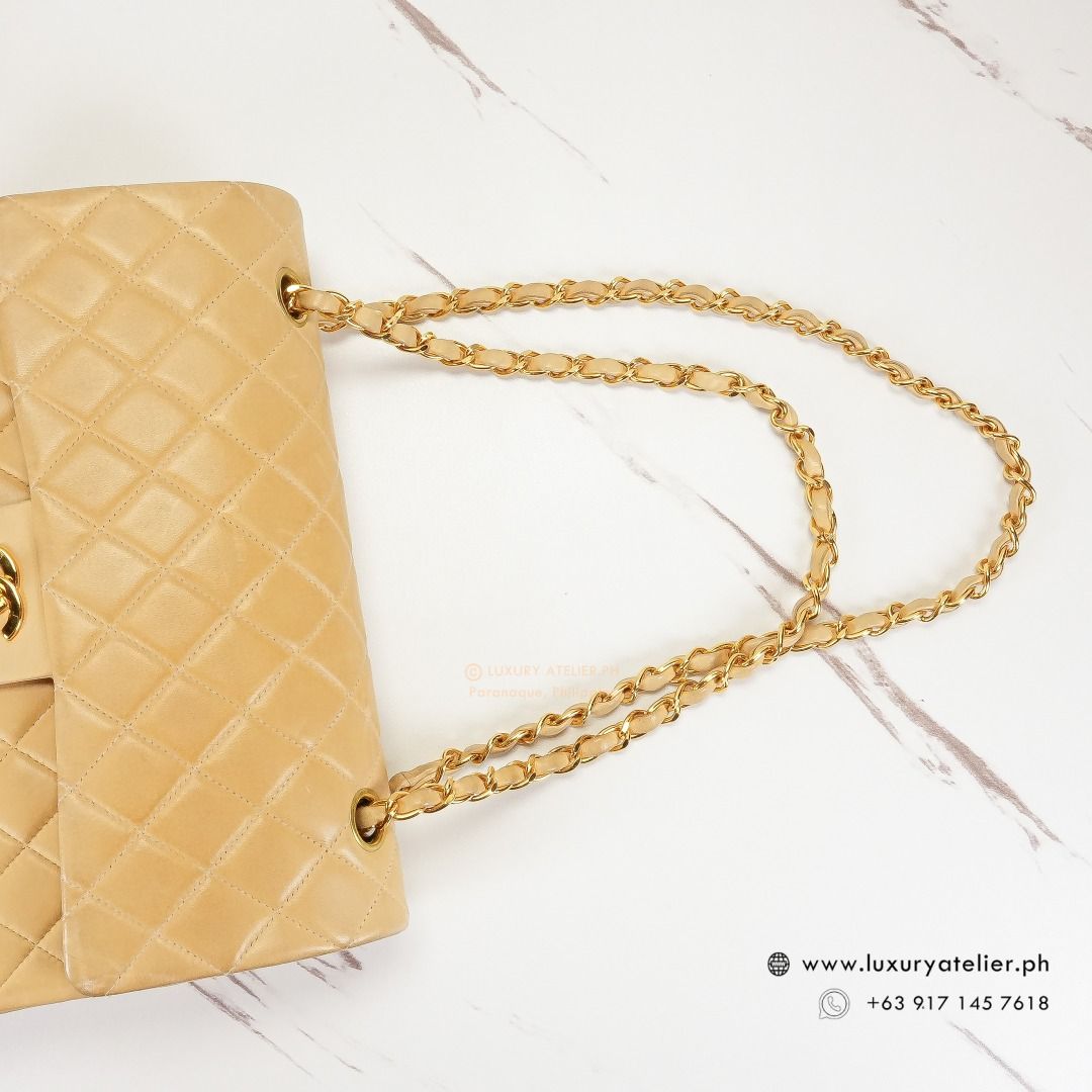 CHANEL Vintage Double Flap 24k Dark Beige; Date Code: Series 5 (Category: Luxury Bags & Wallets) located in Paranaque City. Submitted by luxuryatelier.ph (Listing ID 1279519629, Image 3). Description: CASH / LAYAWAY*: Php 230000 only (*Up to 6 weeks installment) CARD* : Php 239200 only (*Up to 6 months installment) Model: Vintage Double Flap 24k Dark Beige; Date Code: Series 5 Rating: 8-8.5/10 Very Good Condition Material: Lambskin; Color: Dark B