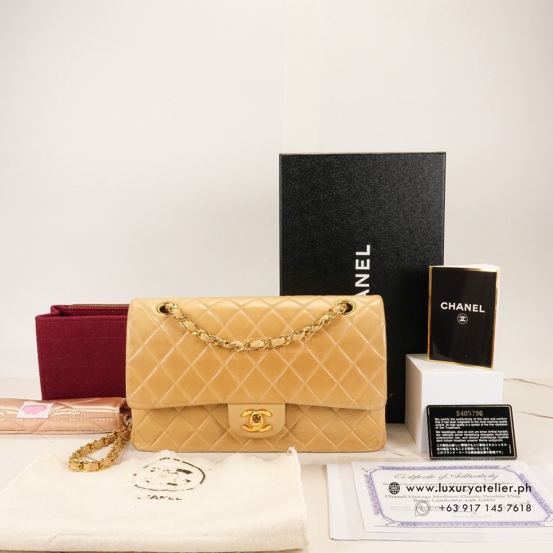 CHANEL Vintage Double Flap 24k Dark Beige; Date Code: Series 5 (Category: Luxury Bags & Wallets) located in Paranaque City. Submitted by luxuryatelier.ph (Listing ID 1279519629, Image 2). Description: CASH / LAYAWAY*: Php 230000 only (*Up to 6 weeks installment) CARD* : Php 239200 only (*Up to 6 months installment) Model: Vintage Double Flap 24k Dark Beige; Date Code: Series 5 Rating: 8-8.5/10 Very Good Condition Material: Lambskin; Color: Dark B