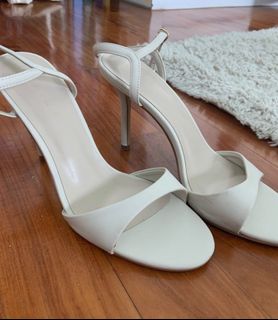 White shop spiked heels