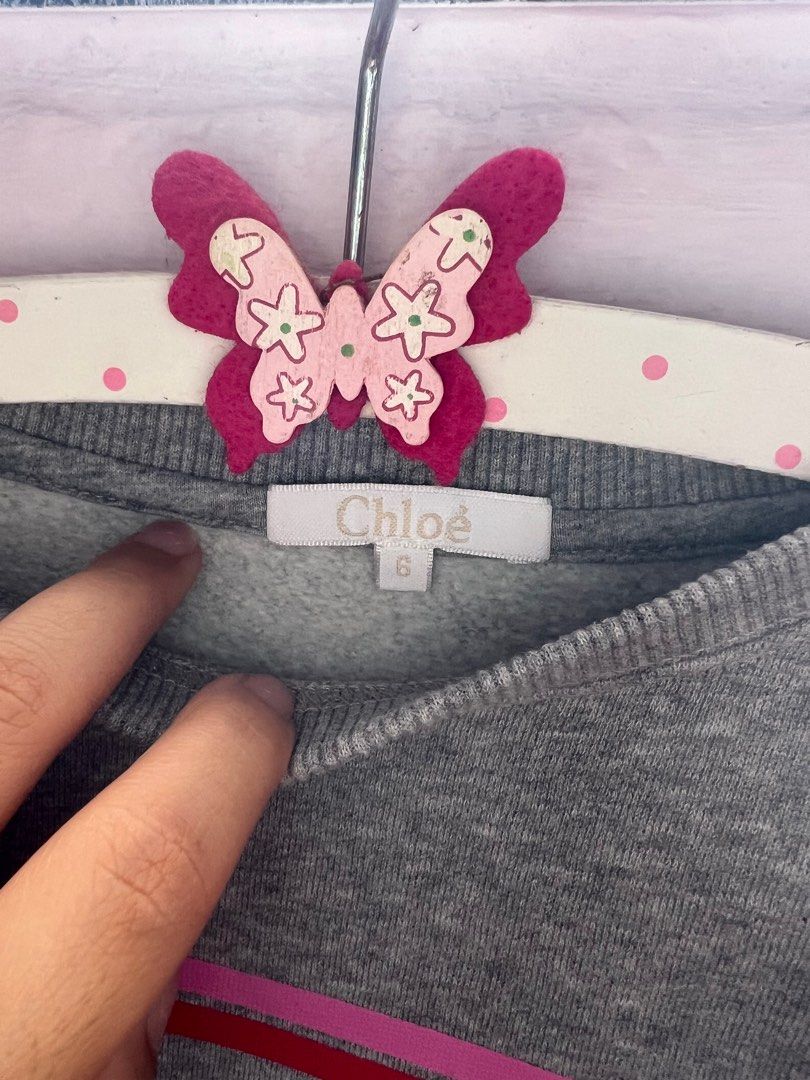 Chloe sweater (Category: Babies & Kids Fashion) located in Singapore. Submitted by m_w_a (Listing ID 1279559677, Image 2). Description: Worn twice before my girl outgrown it. Very beautiful piece from Chloe. Bought it at $300+, letting go at only $50 now. Self collect near BT Timah CC.