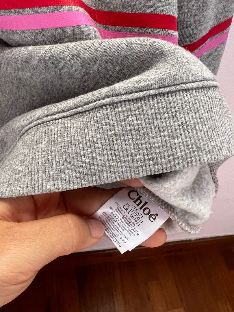 Chloe sweater (Category: Babies & Kids Fashion) located in Singapore. Submitted by m_w_a (Listing ID 1279559677, Image 3). Description: Worn twice before my girl outgrown it. Very beautiful piece from Chloe. Bought it at $300+, letting go at only $50 now. Self collect near BT Timah CC.