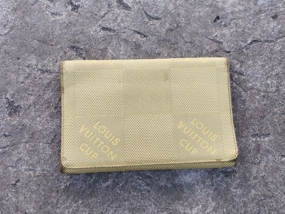 Louis Vuitton cup fold wallet (Category: Luxury Bags & Wallets) located in Manila. Submitted by maxxxxxxxxxxxx (Listing ID 1279606252, Image 1). Description: for sale cup wallet pretty big abit sticky can be washed.