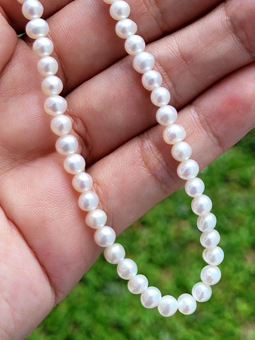 Genuine Freshwater Baby Pearl Necklace with 18K Gold Clap