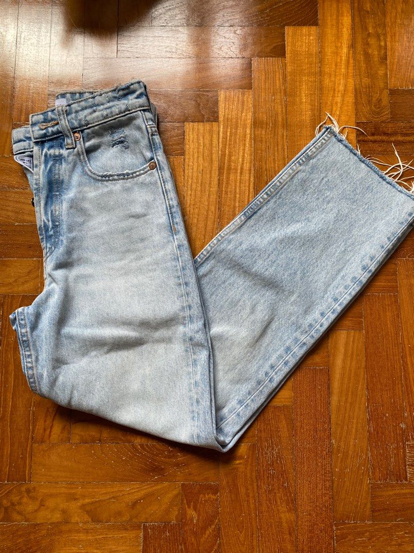 Frayed blue jeans store