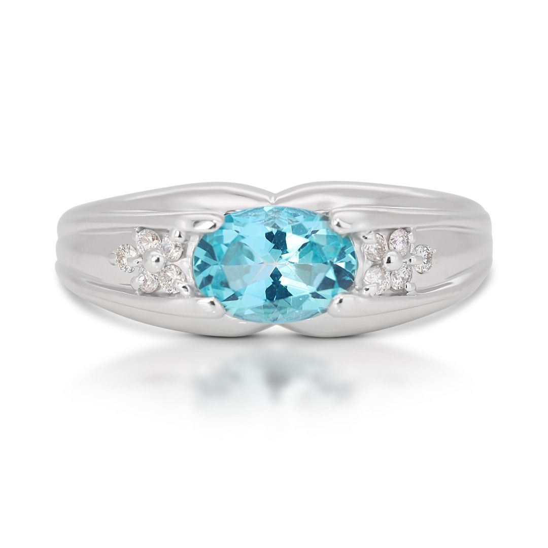 White gold ring with blue topaz store