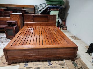 Antique narra bed with attached cabinet and side table