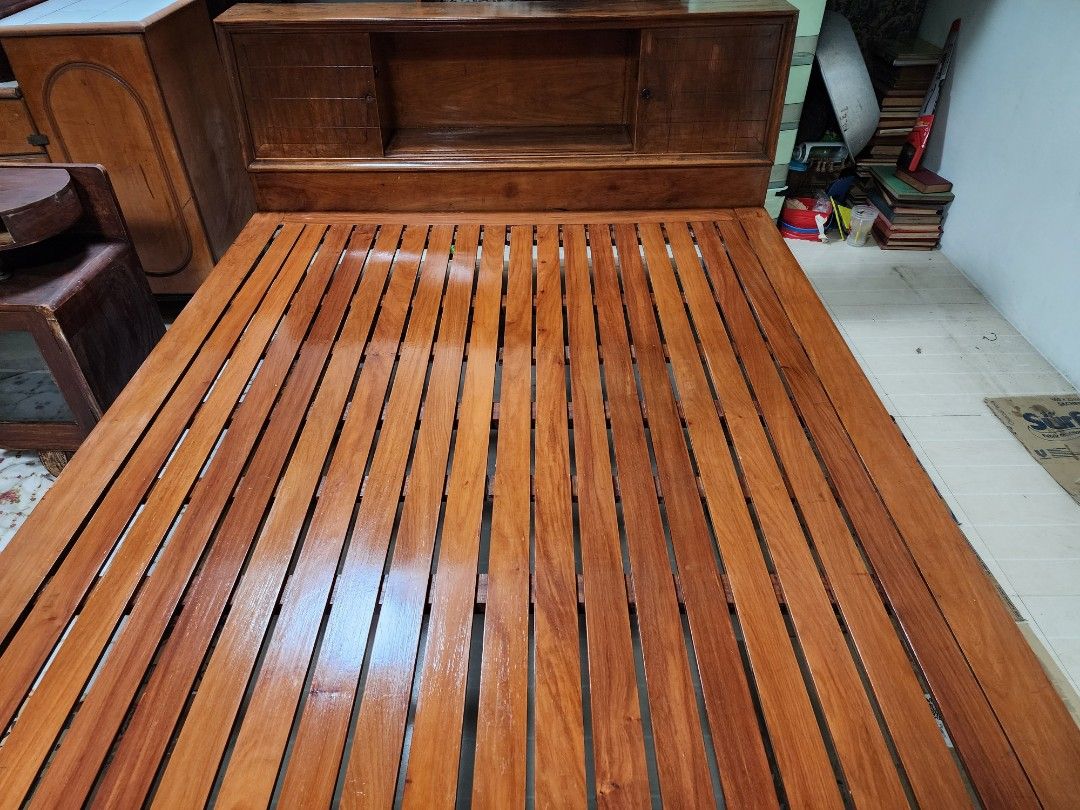 Bed (Category: Bed Frames & Mattresses) located in Quezon City. Submitted by jaluaguevillanueva (Listing ID 1279763829, Image 3). Description: solid hard wood bed with attached headboard cabinet and side table.