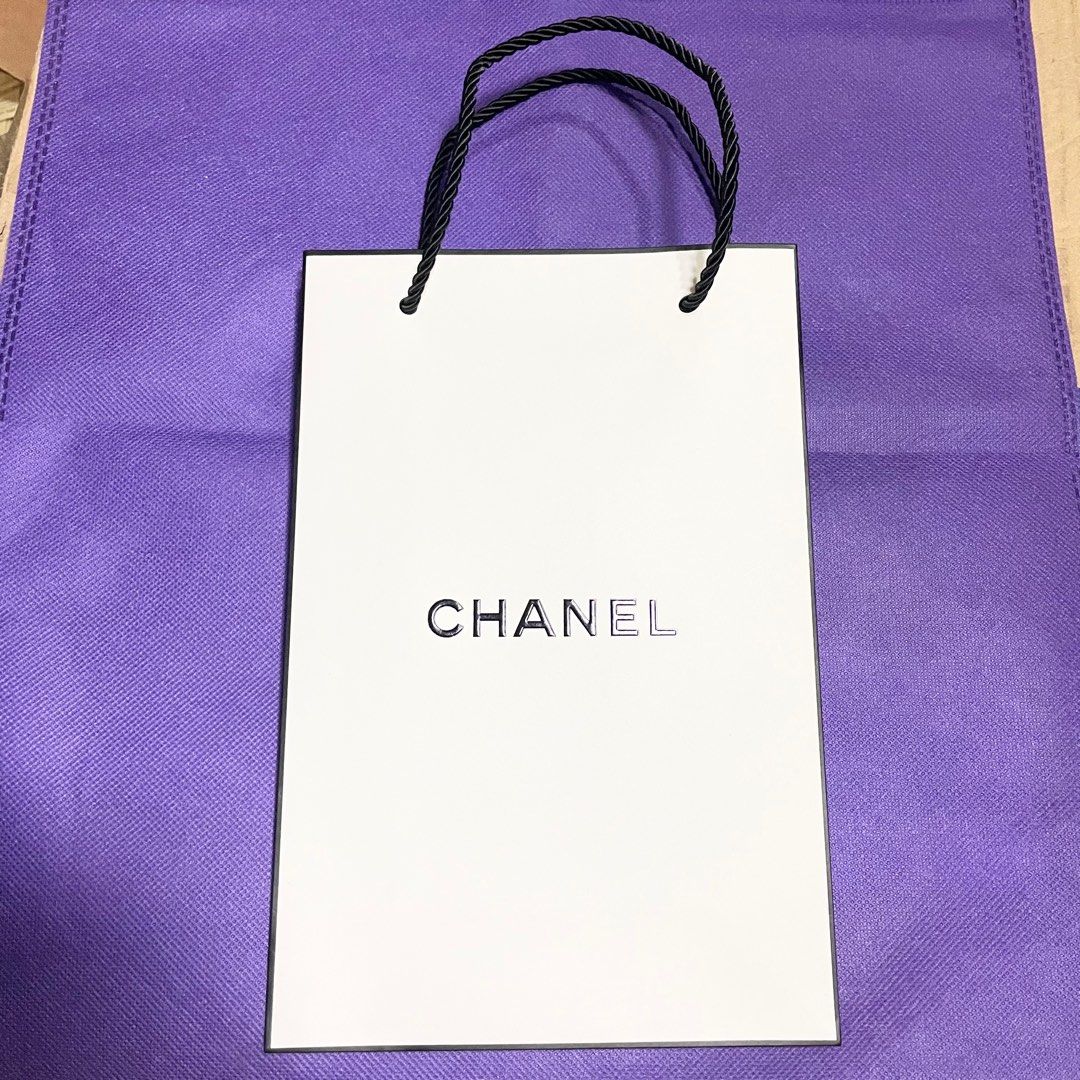 Chanel plain white paperbag paper bag gift bag (Category: Makeup) located in Pasig City. Submitted by vanityboutique (Listing ID 1279746202, Image 1). Description: Pm for more details spacious u can put makeup perfume and etc Brand new and authentic Selling low and affordable One of the best selling brands in the makeup skincare perfume world Size approx 9.5 inches by 6.2 inches medium size paperbag .