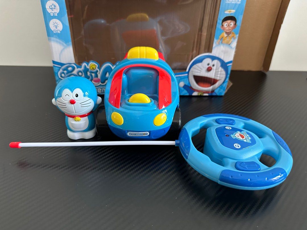 Doraemon Kids Remote Control RC car with light and music Hobbies