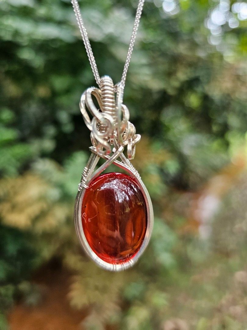 Rare Ruby Red Coloured Amber Pendant set in Sterling Silver