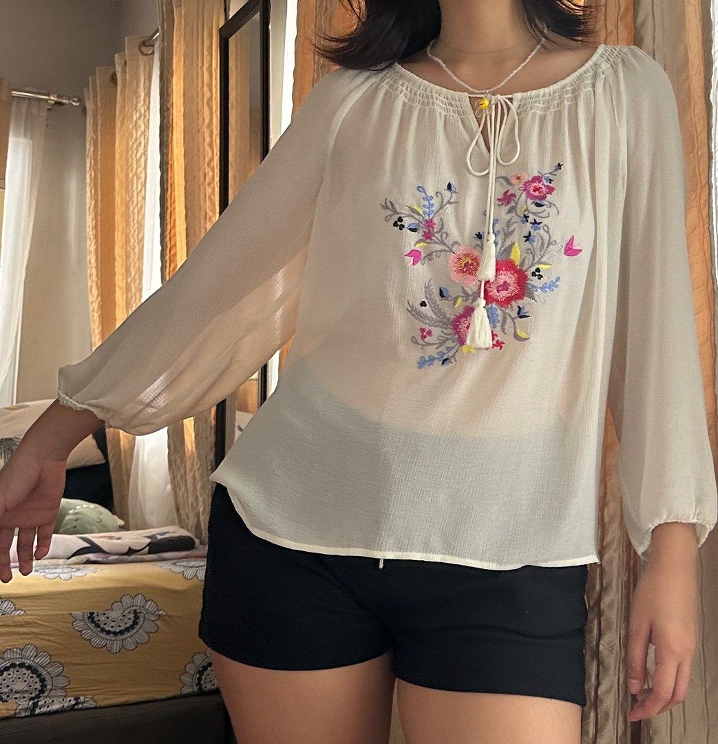 Sheer embroidered top (Category: Blouses) located in Mandaluyong City. Submitted by tenohthree (Listing ID 1279894900, Image 2). Description: Very airy top good for a cover up or wear a skintone tank underneath. Cute for sunny days. Fits S-M.