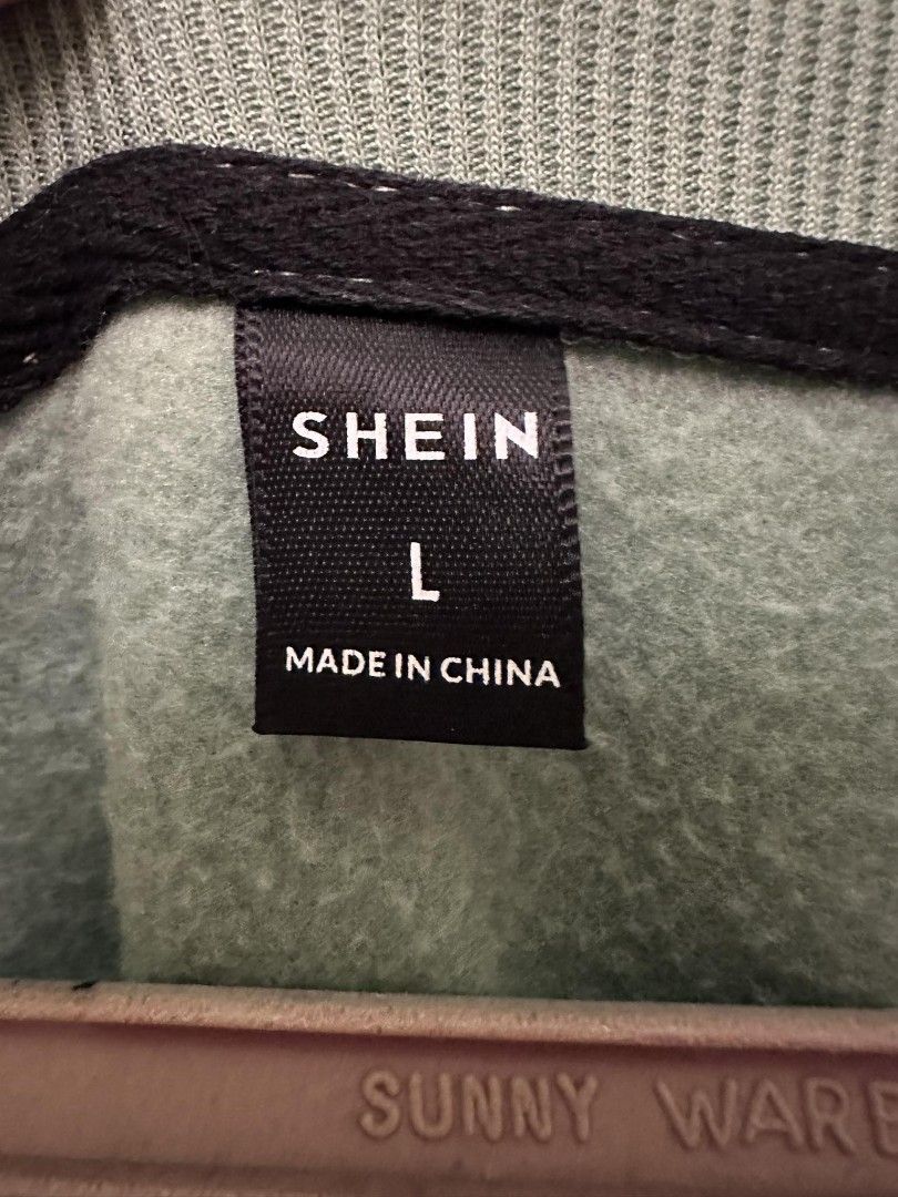 Green Shein New York sweatshirt (Category: Hoodies) located in Lipa City. Submitted by randomyseller (Listing ID 1279891396, Image 3). Description: Hindi po sya nagagamit barely used po nandito lng po sya good condition no damages..