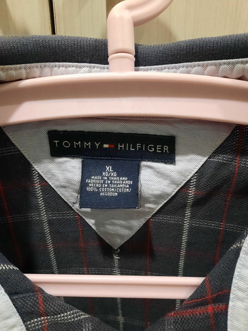 Tommy Hilfiger polo shirt (Category: Tshirts & Polo Shirts ) located in Marikina City. Submitted by phorts (Listing ID 1279785460, Image 3). Description: 28L x 23.5W Fits L-XL Vintage vibe, has some slight fading on the collar PM for additional pics.