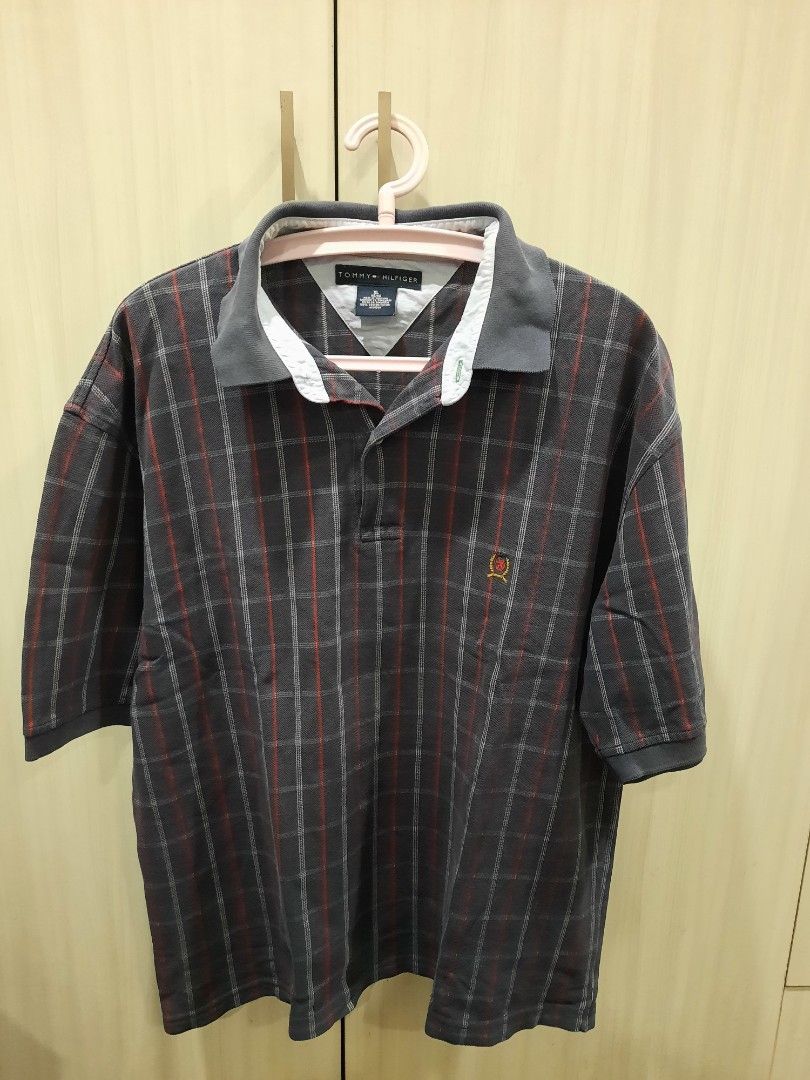 Tommy Hilfiger polo shirt (Category: Tshirts & Polo Shirts ) located in Marikina City. Submitted by phorts (Listing ID 1279785460, Image 1). Description: 28L x 23.5W Fits L-XL Vintage vibe, has some slight fading on the collar PM for additional pics.