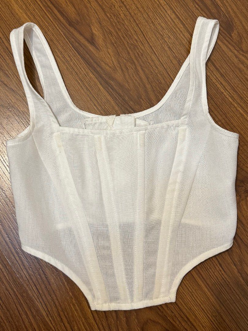White Corset Top (Category: Others Tops) located in Taytay. Submitted by ac.declutters (Listing ID 1279862458, Image 2). Description: - used once - still good as new - rfs: doesn’t fit me na.