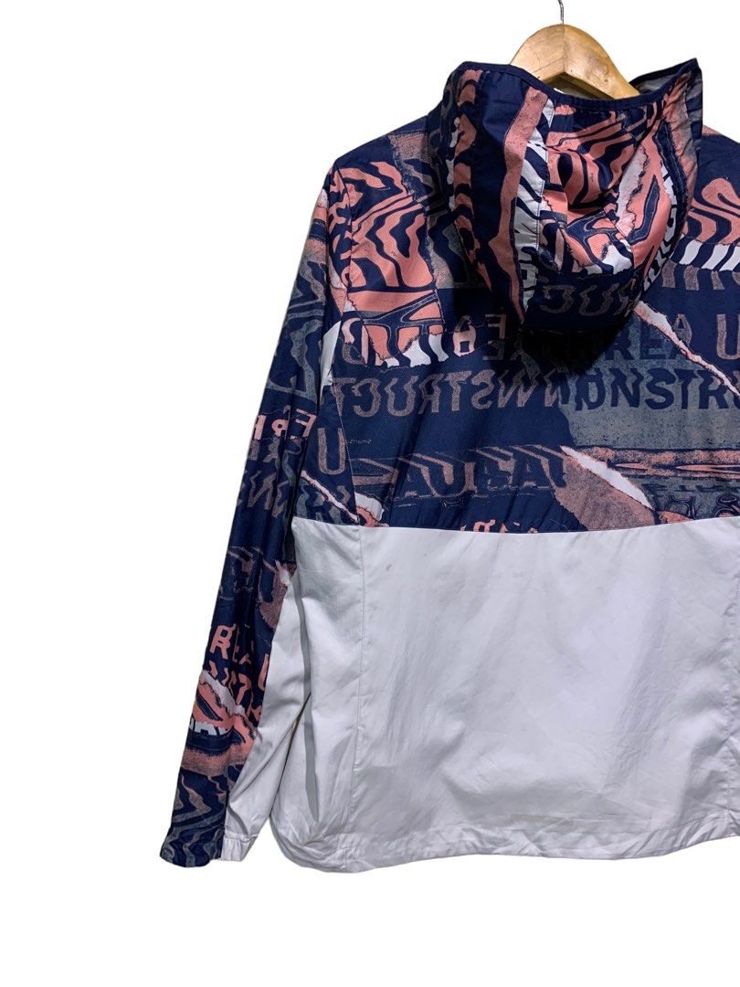 Own the run shop city clash wind jacket